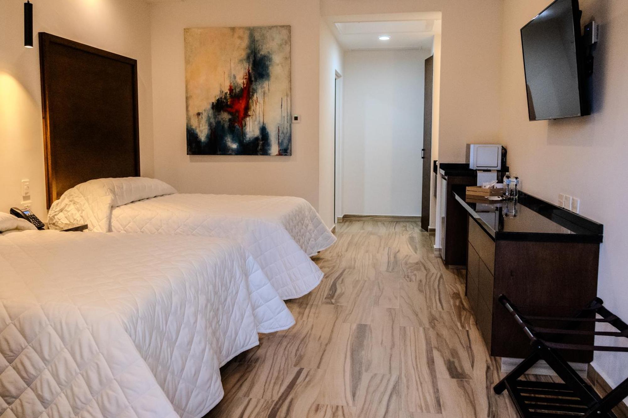 Hotel Gran Avenida, Навохоа Экстерьер фото